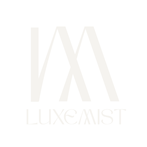 White 'LUXEMIST' logo on a white background